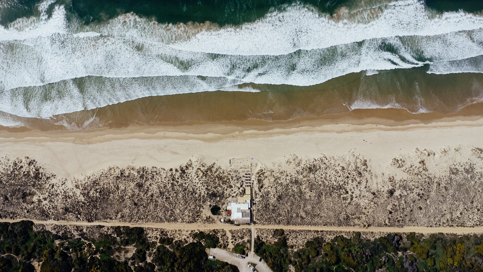 the caparica shoreline from above