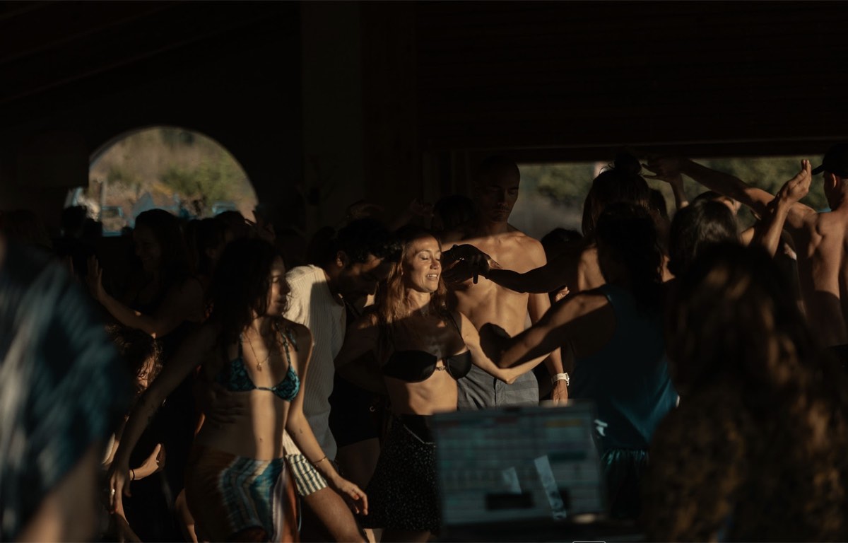 Dancers moving freely during golden hour at EDLX spring equinox festival